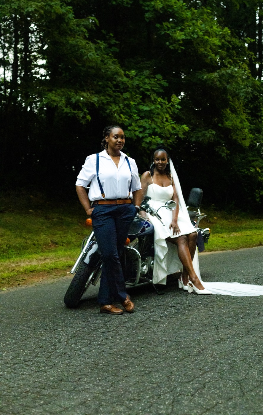 Tasha and Tiara, motorcycle love, frame 57
