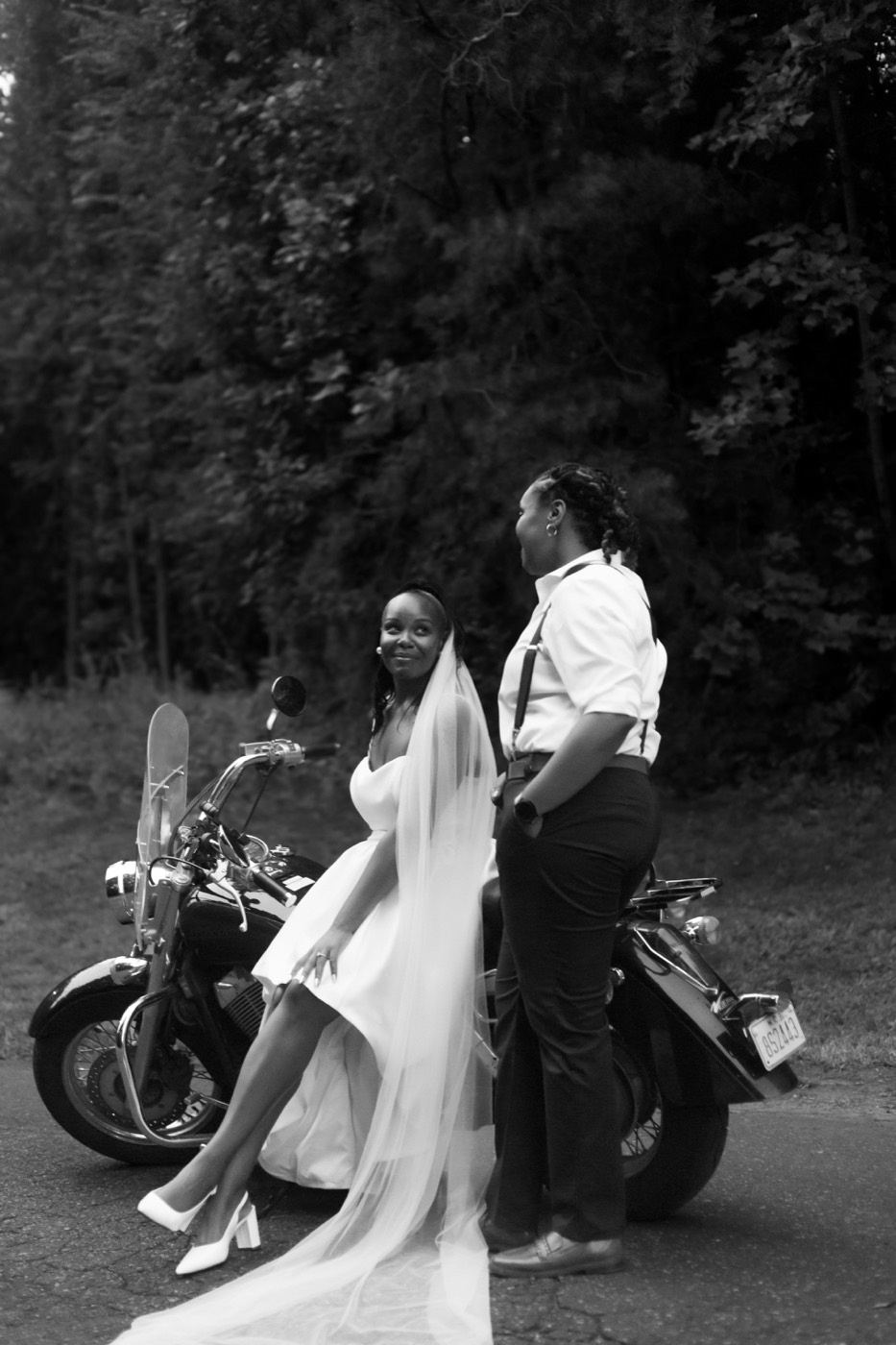 Tasha and Tiara, motorcycle love, frame 61